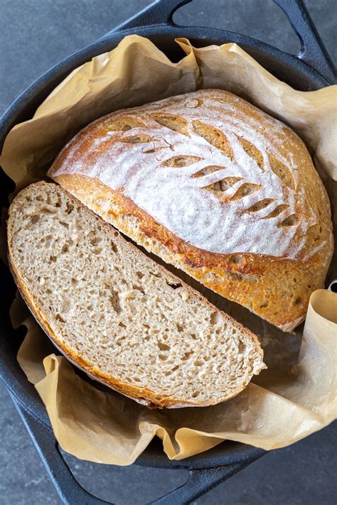 Sourdough wheat bread. Be sure to wear good oven mitts to prevent steam burns. Bake the bread until it’s crusty and golden, about 35 to 40 minutes. Remove the loaves from the oven and cool on a rack before slicing. Store leftover bread, in a paper bag or loosely covered in plastic, for a day or so at room temperature; wrap and freeze for longer storage. 