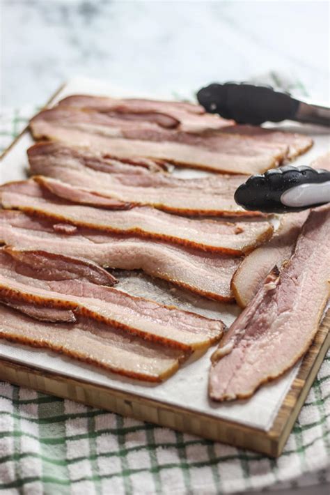 Sous vide bacon. 8 oz Soy Sauce. 2 oz Molasses. Combine all ingredients in a bowl and whisk to combine well. 2. Combine Curing Liquid with Pork Belly in a Bag. I cut the pork belly in half so it would fit into two separate bags, so pour … 