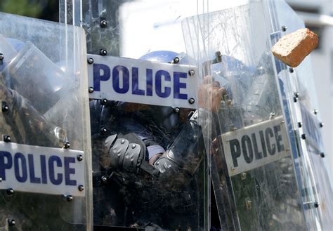 South Africa arrests 8 officers assigned to the country’s deputy president over highway brutality