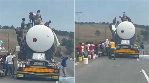 South Africans loot and bath in Milk! - YouTube