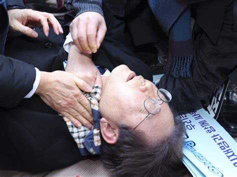 South Korean police raid house of suspect who stabbed opposition leader Lee in the neck