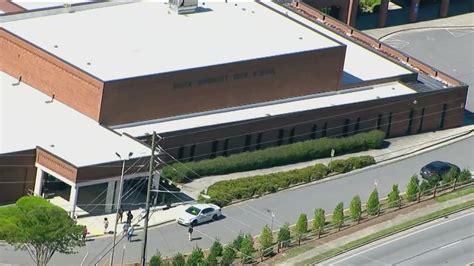 South gwinnett high school on lockdown. During a hard lockdown all school interior doors are locked and students are confined to their classrooms and no entry or exit of the school is allowed. This takes place if there is a threat or possible threat inside the school. During a soft lockdown all exterior doors are locked. This takes place if the threat is outside of the school. 