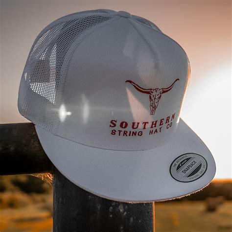 Southern string hat co. NC Flag Hat. $24.99 USD. Shipping calculated at checkout. Pay in 4 interest-free installments for orders over $50.00 with. Learn more. Color. Black Dark Green/White Navy/White Grey/White Grey/Black Red/White Sea Blue/White Columbia Blue/White Black/White. Quantity. 