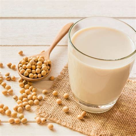 Soy milk. Rinse off the soybeans and place in a large bowl. Add enough filtered water that the beans are covered by several inches. Allow the beans to soak for 12-18 hours, or until the skins pop off easily when squeezed. . Drain the beans and place in a blender along with 6 cups water. Puree until very smooth, 2-3 minutes. 