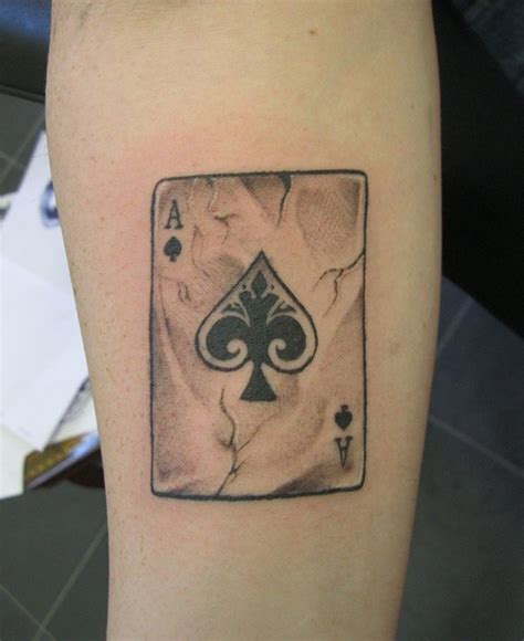 The iconic ace of spades. Spade Symbolism in Tattoos. The spade symbol is a popular tattoo design. Some meanings include: Good luck - from its high value in cards and gambling; Darkness - black color and grim reaper associations; Death - correlations with the ace of spades as the death card; Rebirth - upside down heart suggesting renewal