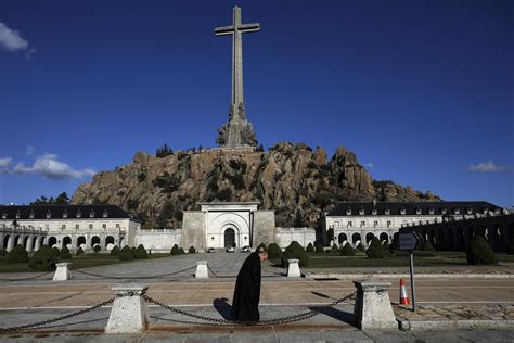 Spain exhumes fascist party founder from Madrid mausoleum