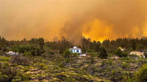 Spanish authorities evacuate some 500 people to escape a wildfire on the Canary island of La Palma