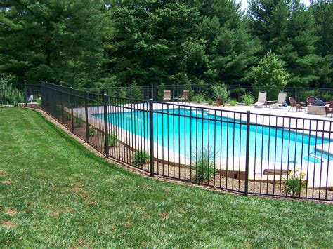This Specrail fence section is a classic at the height of simplicity with a smooth top rail that seamlessly incorporates pickets that do not extend through the bottom rail. . Specrail