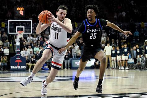 Spencer scores 20 points, leads No. 4 UConn to 85-56 blowout of DePaul in Big East play