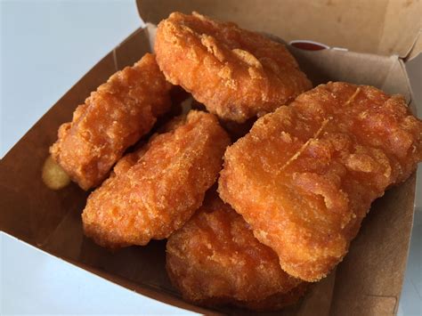 Spicy chicken mcnuggets. 2. Microwave on high for 3 minutes using a 1000w microwave. 3. Let stand 1 to 2 minutes before serving. 1. Preheat air fry to 375 degrees F. 2. Place frozen chicken pieces in basket in a single layer. 3. Air fry for 10 minutes. 