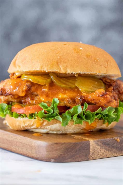 Spicy chicken sandwich recipes. How To Make spicy chicken sandwich. If deep-frying, in a deep fryer or cast iron pot, heat 6-8 cups of oil to 375 degrees. If pan-frying, heat 1 1/2 - 2 cups oil (about 1/2 inch in the pan) in a large, heavy-bottomed frying pan. In a large bowl or pie pan, whisk together hot sauce, water, and egg. 