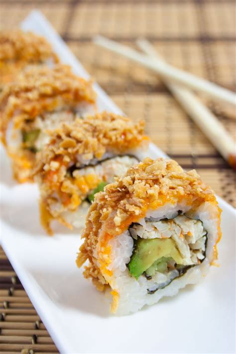 Spicy crab meat roll. In a medium bowl, combine the shredded imitation crab, cucumber slices, and ½ cup frozen or canned corn (defrosted/drained) To the same bowl, add the dressing ingredients: 2 Tbsp Japanese Kewpie mayonnaise, 1 Tbsp ponzu, 1 Tbsp toasted white sesame seeds, and ½ tsp soy sauce. Combine well. 