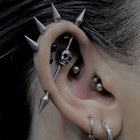 Spike ear piercing. Things To Know About Spike ear piercing. 
