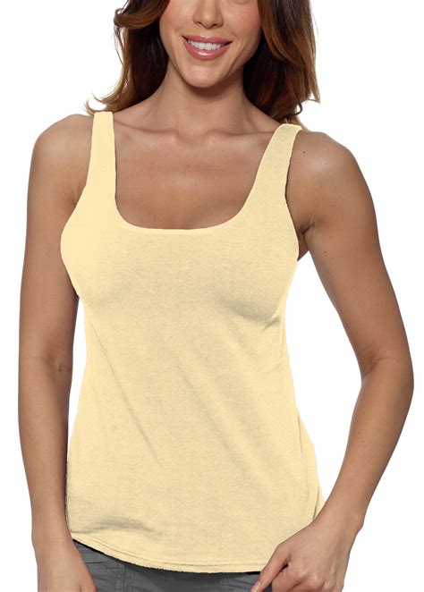 Sports bra tank. 9 Best Tank Top with Built-in Sports Bra (Tank Tops with Built-in Bra Support) 1. ICYZONE Built-in Bra Tank Top. This is an open back tank top that has a removable padded sports bra. It is built in such a way that it is a workout bra that is wrapped with a top. Although it was designed with yoga poses, you can as well perform your … 