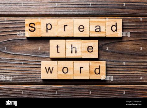 Spread the Word Word Written on Wood Block. Spread the Word Text on