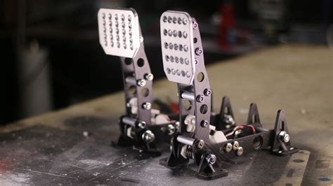 Spring for sim pedals.  With adjustable tension and durable construction, the ...