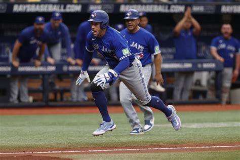 Springe’r’s inside-the-park homer, diving catch and throw lead Blue Jays over Rays 9-5