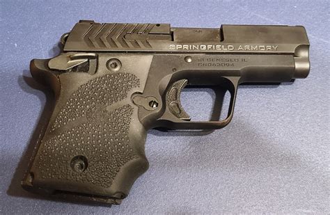 Description: For sale: One (1) new in box Springfield 911 Bitone, 9mm. This pistol has a 2.7 inch stainless barrel, Ameriglo Pro-Glo tritium front sight, tactical rack green tritium rear sight and comes with two magazines (one 6 round flush fitting and one 7 round extended), cable lock, soft case, pocket holster, factory paperwork and the factory cardboard box.. 