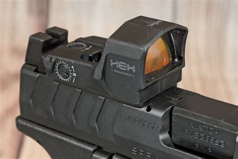 Springfield armory pistols with red dot sights.  Already employed on Springf...