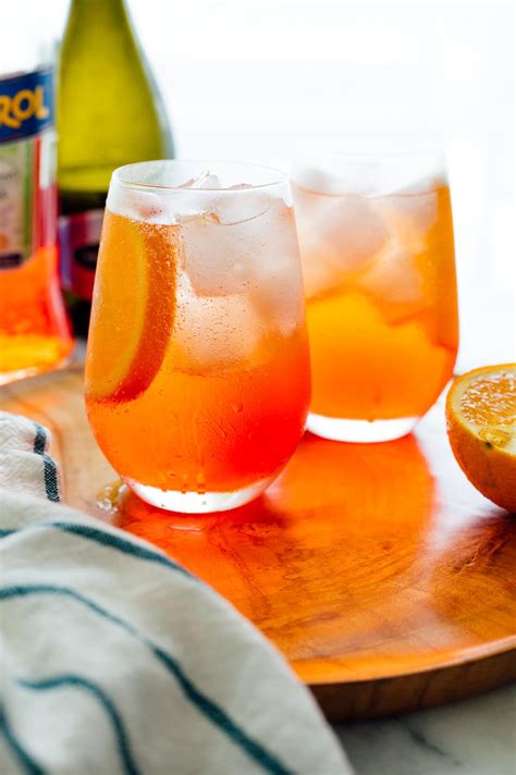 Spritzes. Ingredients: 75ml Prosecco, 50ml Aperol, 25ml soda water to top. Glass: Wine. Garnish: Orange slice. Method: Fill the glass with ice and build the ingredients in the glass, first pouring in the Aperol, then the Prosecco and finishing with the soda. Stir and garnish. 