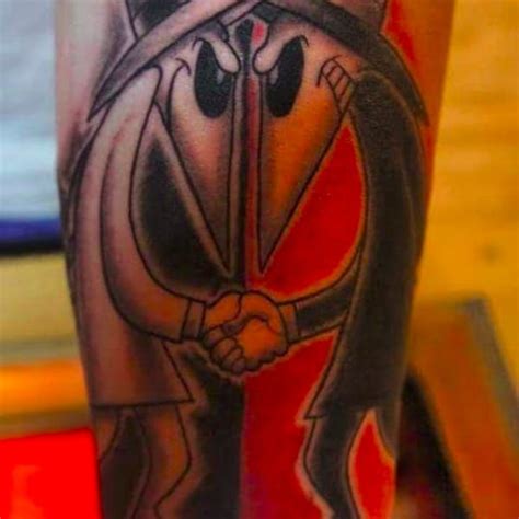 Spy vs Spy tattoos done by Bash Jolly Octopus, Christchurch, New