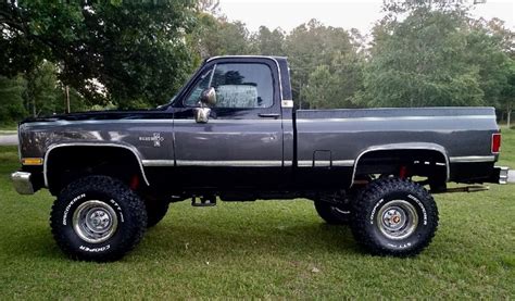 Square body Chevy truck restoration paint job. 