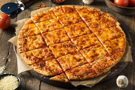Square cut pizza. DETROIT STYLE IS A THICK, SQUARE CUT PIZZA WITH A CRUNCHY CRUST AND A GOLDEN CRISPY BOTTOM. IT IS MADE WITH A BLEND OF BRICK AND MOZZARELLA CHEESE WHICH GIVES ... 