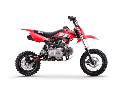 This Kayo dirt bike is the more entry-level version of the Kayo 125cc dirt bike models. It is comparable to popular 110cc pit bikes, such as KLX110, CRF 110, and TTR110, as it has a 12-inch rear wheel and a 14-inch front wheel. It does come stock with inverted forks (although non-name-brand), disk brakes, and electric start.. 