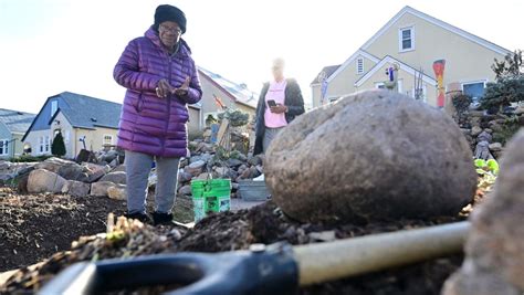St. Paul: Iris Logan has until June 6 to regrade her front yard along Sherburne Avenue