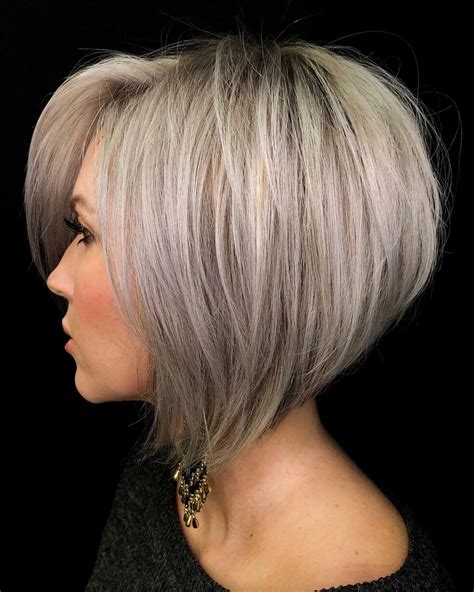 Stacked bob hair. A choppy, inverted bob with bangs and layers is an excellent haircut for thin hair. If you get it razor cut, this will create a subtly choppy cut that is textured and airy with wispy bangs. It has weight removal that allows for volume at the root and movement in the interior. Instagram @oliviaantonhairstylist. 