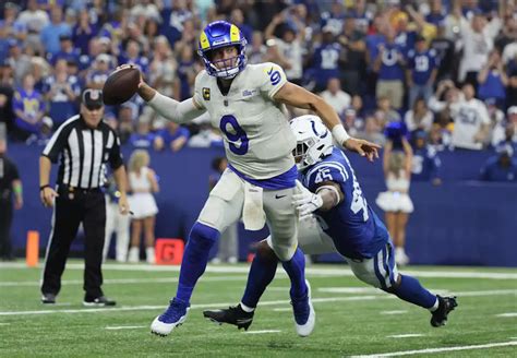 Stafford overcomes injury to throw winning TD pass to Nacua in OT to give Rams 29-23 win over Colts