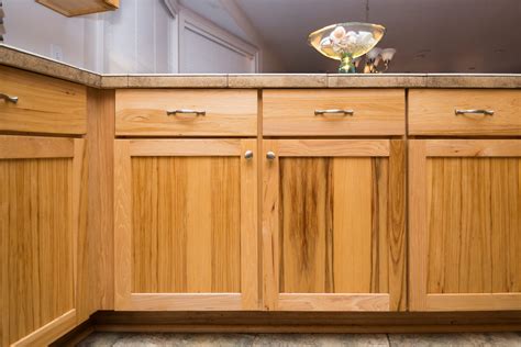 Staining cabinets. To successfully refinish your kitchen cabinets, you will need a few essential tools and materials. These include sandpaper for smoothing the surfaces, a quality stain and polyurethane product, felt tip furniture pen for touch-ups, brushes for applying stain, clean rags for wiping off excess stain, and a drop cloth or plastic sheeting to protect ... 