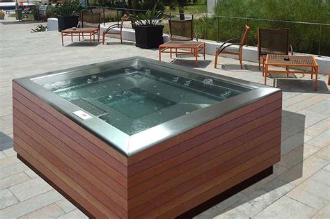 Stainless steel hot tub. This hot tub features 2 quiet operating, Super high-flow 5.2 BHP pumps with 40 stainless steel jets, including a set of adjustable neck/shoulder jets and a Turbo massage jet. These powerful jets are arranged differently in each seat and the multi-color starburst LED light gives you control over the mood. 