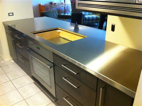 Stainless steel kitchen counter. Stainless steel countertops add clean lines and a sleek elegance to the kitchen, while providing a superior workspace for the serious cook. Stainless steel is non-porous and therefore does not absorb odors, … 