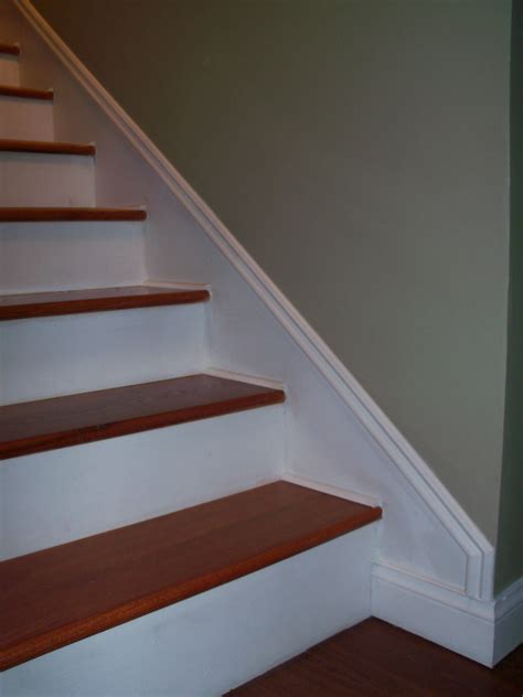 Stair moulding. Be inspired, too, by finishes in clean light hues, moody darks, and natural wood tones. 1. Use stair paneling to add texture. You might opt for stair paneling ideas rather than wallpaper to bring texture to a wall. ‘ Paneling adds depth to this entryway, and dresses up the space,’ says Julie Dodson of Dodson Interiors. 