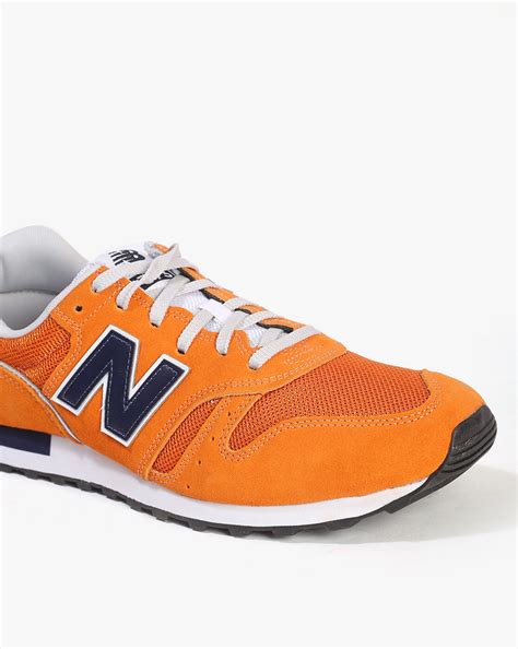 Stand Out with Style: Experience the Electrifying Appeal of New Balance Orange Shoes**