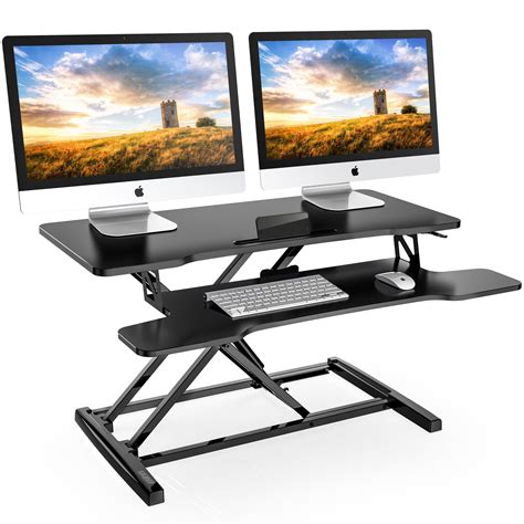 Standing desk stand. The large standing desk smoothly transitions from 25" to 50.5" high with a single touch. Trusted Brand: Shop confidently with Vari, featuring a 30-day free returns policy and a reliable 5-year warranty for your work from home desks. Note: The desk comes in 2 cartons—desk frame and desk top. › 