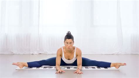 Standing straddle stretch.  Training your middle split benefits the rest of you...