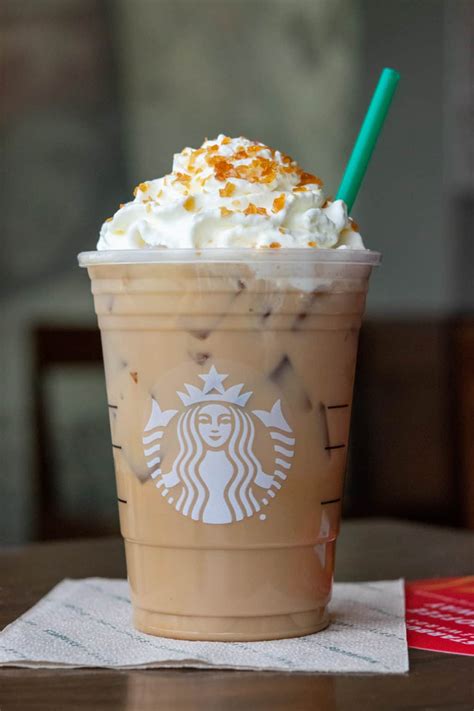 Starbucks caramel brulee latte. Starbucks Caramel Brulee Latte Almondmilk No Whip (1 grande) contains 59g total carbs, 58g net carbs, 5g fat, 3g protein, and 290 calories. 