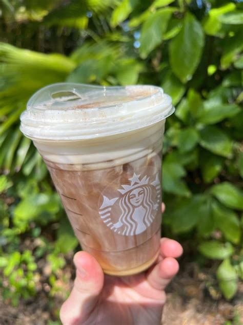 Starbucks cinnamon caramel cold brew. Starbucks® Nitro Cold Brew topped with lightly sweet cinnamon, vanilla syrup and oatmilk cold foam—50 calories with layers upon layers of delicious flavors. 50 calories, 5g sugar, 1.5g fat Full nutrition & ingredients list 