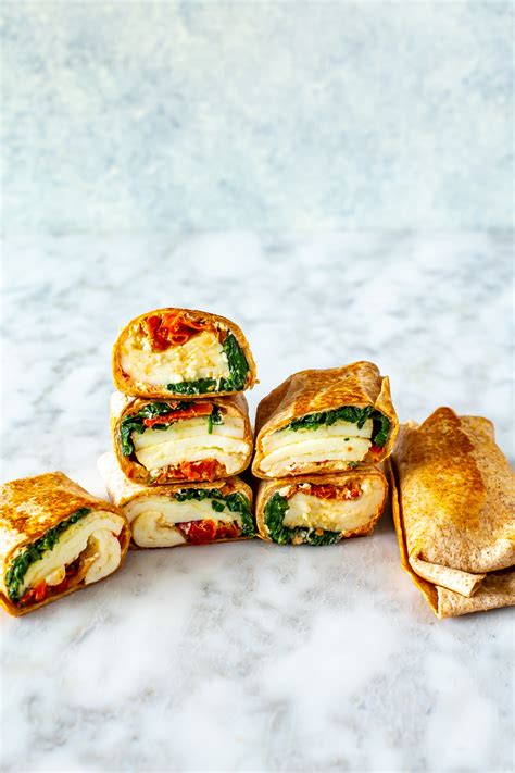 Starbucks feta wrap. Copycat Starbucks Spinach and Feta Breakfast Wrap - Quick, on- the- go breakfast with this Starbucks-inspired healthy Spinach and Feta Breakfast Wrap. 