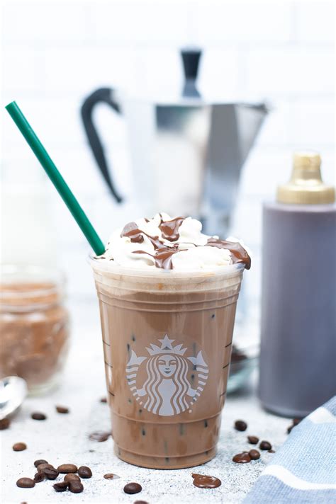 Starbucks iced mocha. 1. Tbsp. Chocolate syrup. 250. ml cold milk. 6-8 ice cubes. Whipped cream. - 1. Serving (s) +. Shop now. Iced Mocha Step 1 Desktop. STEP 1. Brew 2 shots of … 
