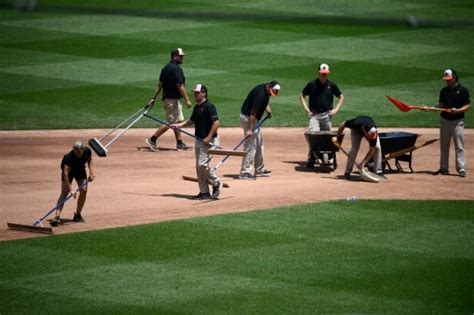Start of Orioles-Dodgers game Wednesday delayed 41 minutes as grounds crew works on wet field