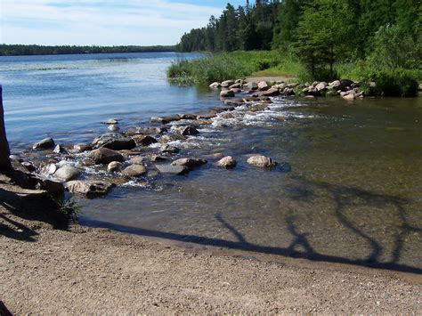 Start of mississippi river. People from around the world come to Itasca State Park in northwest Minnesota to marvel at the serene birthplace of the mighty Mississippi River. They pose next ... 