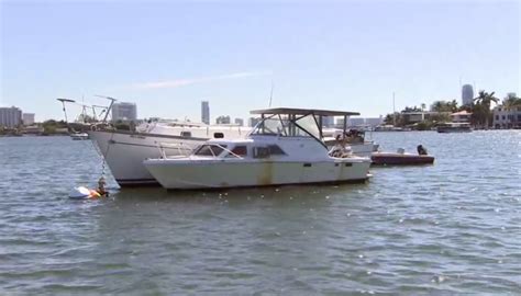 State and local officials launch campaign to tackle derelict boats in Biscayne Bay