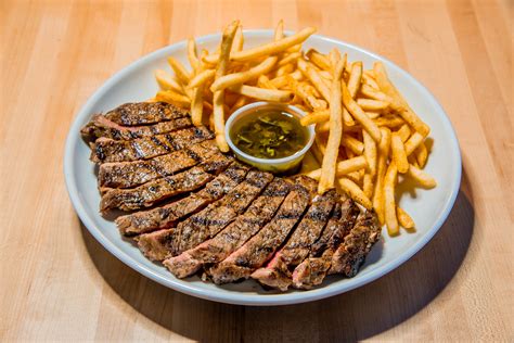 Steak and frites. Directions. In a large Dutch oven or straight-sided 12-inch saute pan, heat the olive oil over medium heat. Add the shallots and garlic and cook until … 