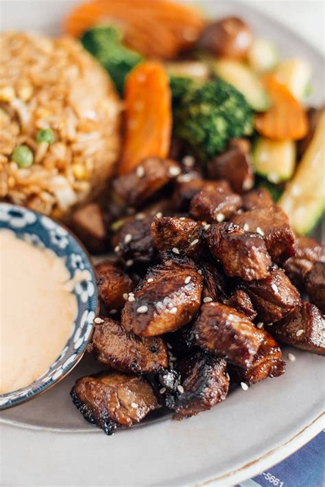 Steak hibachi. Bring a large pot of salted water to a boil over medium heat. Separate the egg roll wrappers into 2 piles. Roll each pile up into a log. Slice the log into thin strips about 1/4-inch thick and ... 