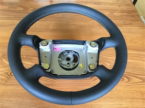STEERING WHEEL RE-TRIM. We can recover, re-trim 