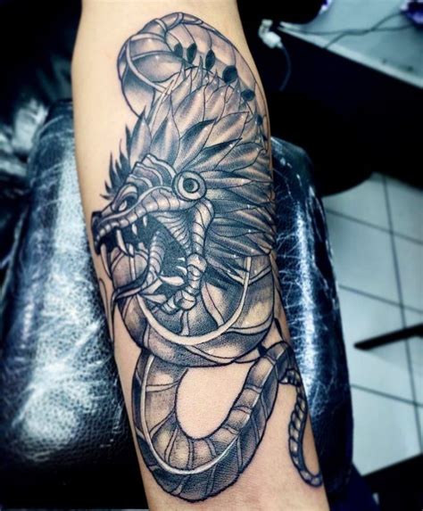The Quetzalcoatl tattoo is a symbol of ancient Aztec worship unlike anything else in the world. Symbolizing the Feathered Serpent God, this powerful mark pays …. 