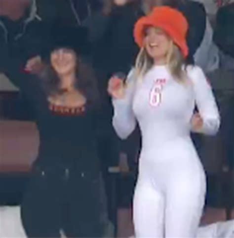 Stephanie niles bodysuit. Niles, who has been the 27-year-old QB’s partner for five years, stunned viewers with her outfit: a white bodysuit complete with fluffy orange hat and booties. Niles first drew the crowd’s ... 